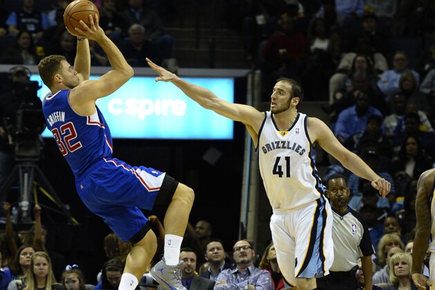 Feb 21, 2014; Memphis, TN, USA; Los Angeles Clippers power forward Blake Griffin (32) shoots the ball over Memphis Grizzlies center Kosta Koufos (41) during the second quarter at FedExForum. Mandatory Credit: Justin Ford-USA TODAY Sports