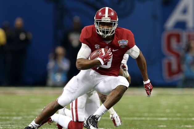 Jan 2, 2014; New Orleans, LA, USA; Alabama Crimson Tide wide receiver Amari Cooper (9) runs after a catch against the Oklahoma Sooners during the first quarter of the Sugar Bowl at the Mercedes-Benz Superdome. Mandatory Credit: Chuck Cook-USA TODAY Sports
