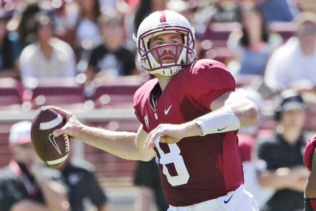 Stanford quarterback Kevin Hogan throws against UC Davis during the first half of an NCAA college football game on Saturday, Aug. 30, 2014, in Stanford, Calif. (AP Photo/Marcio Jose Sanchez)