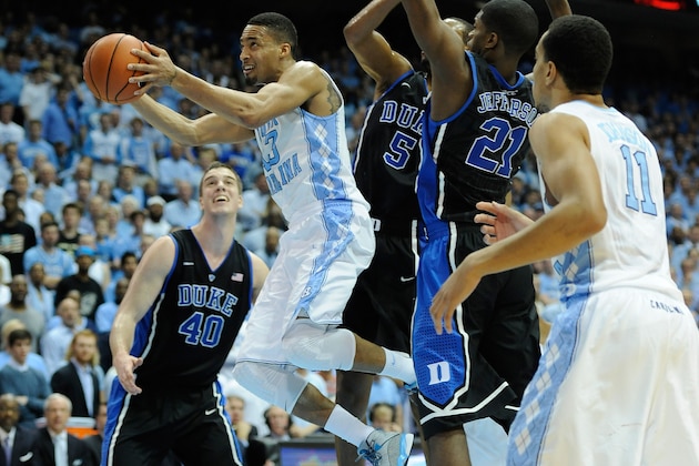 CHAPEL HILL, NC - FEBRUARY 20:  J.P. Tokoto #13 of the North Carolina Tar Heels drives to the basket against the Duke Blue Devils during their game at the Dean Smith Center on February 20, 2014 in Chapel Hill, North Carolina. North Carolina won 74-66.  (Photo by Grant Halverson/Getty Images)