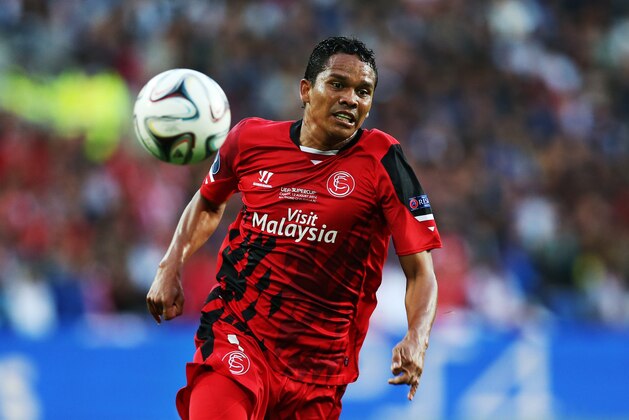 CARDIFF, WALES - AUGUST 12:  Carlos Bacca of Sevilla controls the ball during the UEFA Super Cup match between  Real Madrid and Sevilla at Cardiff City Stadium on August 12, 2014 Cardiff, Wales. (Photo by Ian MacNicol/Getty Images)