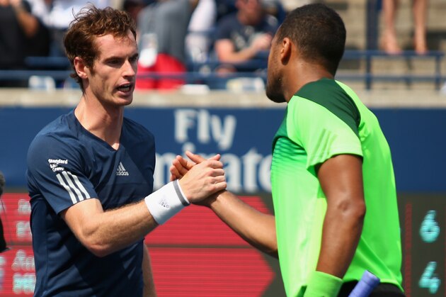 TORONTO, ON - AUGUST 08:  (L-R) Andy Murray of Great Britain shakes hands with Jo-Wilfried Tsonga of France after their quarterfinals match during Rogers Cup at Rexall Centre at York University on August 8, 2014 in Toronto, Canada.  (Photo by Ronald Martinez/Getty Images)