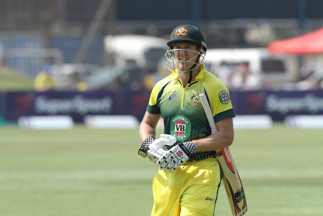 Australian batsman George Bailey walks off the pitch after been bowled out  during the cricket One Day International match against Zimbabwe in  Harare Zimbabwe Sunday, Aug. 31, 2014.(AP Photo/Tsvangirayi Mukwazhi)