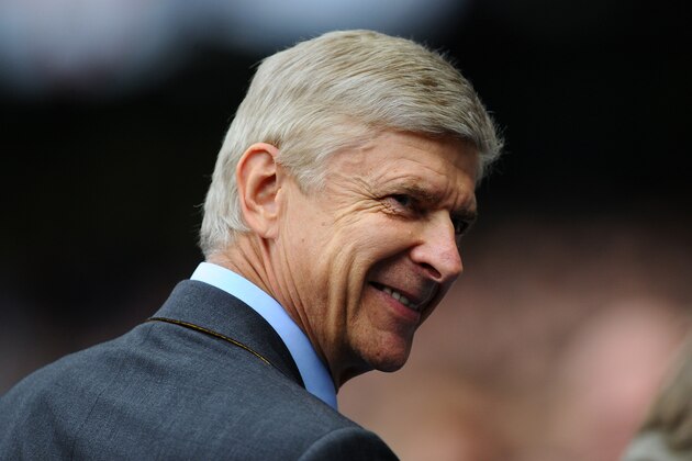 MANCHESTER, ENGLAND - SEPTEMBER 23:  Arsene Wenger, manager of Arsenal smiles ahead of the Barclays Premier League match between Manchester City and Arsenal at Etihad Stadium on September 23, 2012 in Manchester, England.  (Photo by Laurence Griffiths/Getty Images)