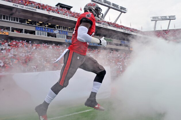 TAMPA, FL -  DECEMBER 15:  Tight end Tim Wright #81 of the Tampa Bay Buccaneers takes the field for play against the San Francisco 49ers December 15, 2013 at Raymond James Stadium in Tampa, Florida. The 49ers won 33 - 14  (Photo by Al Messerschmidt/Getty Images)