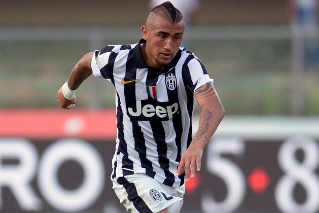VERONA, ITALY - AUGUST 30:  Arturo Vidal of Juventus in action during the Serie A match between AC Chievo Verona and Juventus FC at Stadio Marc'Antonio Bentegodi on August 30, 2014 in Verona, Italy.  (Photo by Dino Panato/Getty Images)