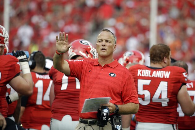 Georgia head coach Mark Richt calls out from the sideline in the first half of an NCAA college football game against Clemson, Saturday, Aug. 30, 2014, in Athens, Ga. (AP Photo/David Goldman)
