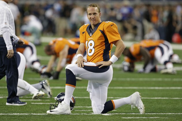 Denver Broncos quarterback Peyton Manning before a NFL preseason football game against the Dallas Cowboys, Thursday, Aug. 28. 2014, in Arlington, Texas. (AP Photo/LM Otero)