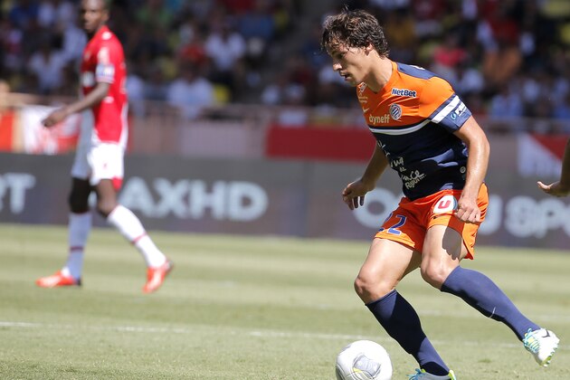 Montpellier's Benjamin Stambouli of France controls the ball during his French League One soccer match AS Monaco vs Montpellier, Sunday, Aug. 18, 2013, in Monaco stadium. (AP Photo/Lionel Cironneau)