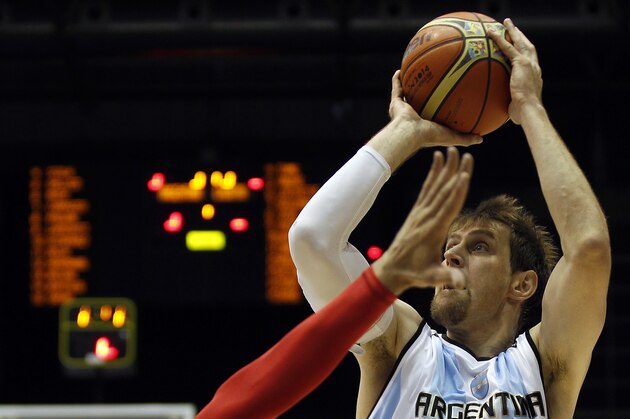 Argentina's Andres Nocioni shoots during the Group B Basketball World Cup match between Argentina and Croatia in Seville, Spain, Sunday, Aug. 31, 2014. The 2014 Basketball World Cup competition will take place in various cities in Spain from Aug. 30 through to Sept. 14. (AP Photo/Miguel Angel Morenatti)