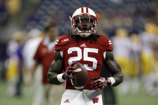 Wisconsin running back Melvin Gordon (25) goes through drills before an NCAA college football game against LSU Saturday, Aug. 30, 2014, in Houston.  (AP Photo/David J. Phillip)