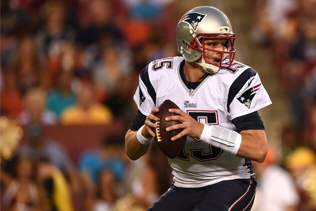 LANDOVER, MD - AUGUST 07: Quarterback Ryan Mallett #15 of the New England Patriots looks to pass against the Washington Redskins during a preseason NFL game at FedExField on August 7, 2014 in Landover, Maryland. The Washington Redskins won, 23-6. (Photo by Patrick Smith/Getty Images)