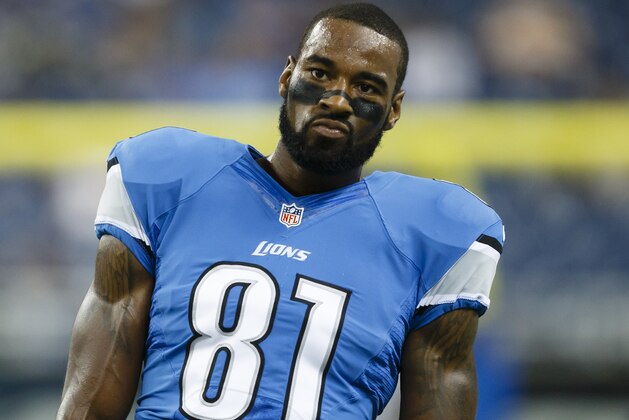 Detroit Lions wide receiver Calvin Johnson (81) during warm ups before a preseason NFL football game between the Detroit Lions and the Jacksonville Jaguars at Ford Field in Detroit, Friday, Aug. 22, 2014. (AP Photo/Rick Osentoski)
