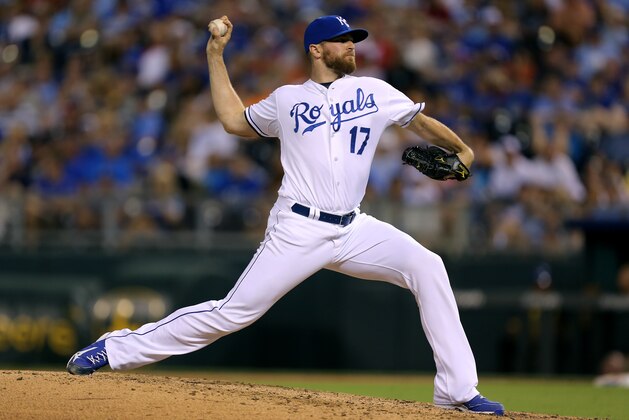 KANSAS CITY, MO - July 24:  Wade Davis #17 of the Kansas City Royals throws in the eighth inning against the Cleveland Indians at Kauffman Stadium on July 24, 2014 in Kansas City, Missouri. (Photo by Ed Zurga/Getty Images)