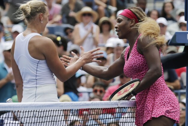 Serena Williams, of the United States, greets Kaia Kanepi, of Estonia, at the net after winning their fourth round match of the 2014 U.S. Open tennis tournament, Monday, Sept. 1, 2014, in New York. (AP Photo/Charles Krupa)