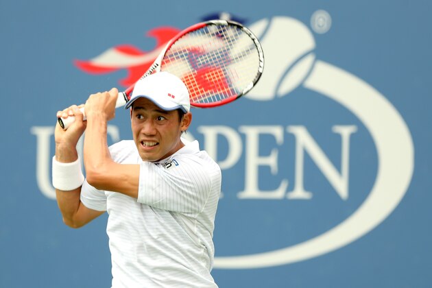 NEW YORK, NY - AUGUST 30:  Kei Nishikori of Japan returns a shot to Leonardo Mayer of Argentina in their men's singles third round match on Day Six of the 2014 US Open at the USTA Billie Jean King National Tennis Center on August 30, 2014 in the Flushing neighborhood of the Queens borough of New York City.  (Photo by Matthew Stockman/Getty Images)