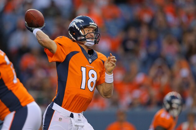 DENVER, CO - AUGUST 23:  Quarterback Peyton Manning #18 of the Denver Broncos throws against the Houston Texans during a preseason game at Sports Authority Field at Mile High on August 23, 2014 in Denver, Colorado.  (Photo by Justin Edmonds/Getty Images)