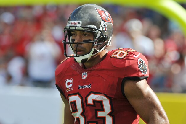 TAMPA, FL -  DECEMBER 8:  Wide receiver Vincent Jackson #83 of the Tampa Bay Buccaneers runs to the bench after an end zone catch against the Buffalo Bills December 8, 2013 at Raymond James Stadium in Tampa, Florida.  The Bucs won 27 - 6. (Photo by Al Messerschmidt/Getty Images)