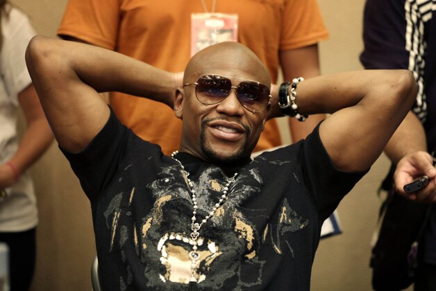 Floyd Mayweather talks to reporters during a news conference in New York, Monday, July 14, 2014. Mayweather will fight Marcos Maidana for the second time in Las Vegas, Nevada on Sept. 13, 2014. (AP Photo/Seth Wenig)