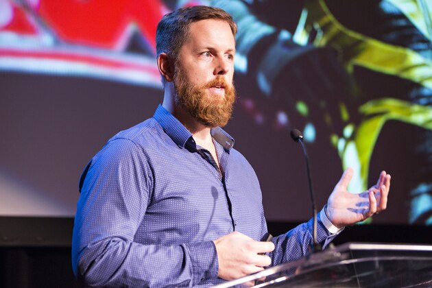 IMAGE DISTRIBUTED FOR 2K - WWE 2K15 Executive Producer Mark Little gives press a sneak peek at never-before-seen gameplay footage at the WWE 2K15 Press Event at Cicada on Saturday, August 16 2014 in Los Angeles. (Photo by Colin Young-Wolff/Invision for 2K/AP Images)