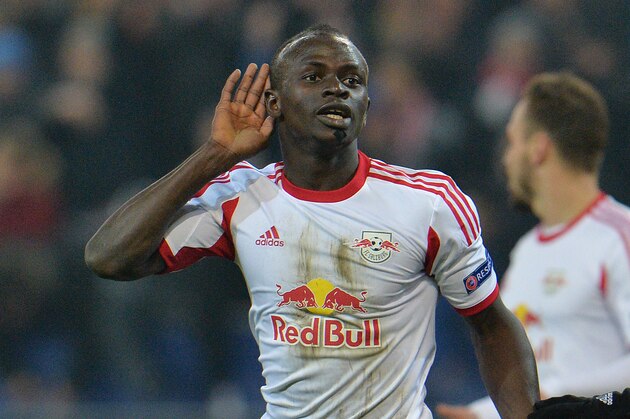 Salzburg's Sadio Mane celebrates after scoring during the Europa League round of 32 second leg soccer match between  Red Bull Salzburg and Ajax in Salzburg, Austria, on Thursday, Feb. 27. 2014. (AP Photo/Kerstin Joensson)