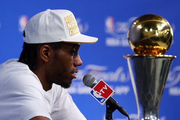 SAN ANTONIO, TX - JUNE 15:  Finals MVP Kawhi Leonard #2 of the San Antonio Spurs speaks to the media after defeating the Miami Heat in Game Five of the 2014 NBA Finals 104-87 at the AT&T Center on June 15, 2014 in San Antonio, Texas. NOTE TO USER: User expressly acknowledges and agrees that, by downloading and or using this photograph, User is consenting to the terms and conditions of the Getty Images License Agreement.  (Photo by Chris Covatta/Getty Images)