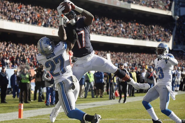 Chicago Bears wide receiver Alshon Jeffery (17) attempts to make a catch in the end zone against Detroit Lions safety Glover Quin (27) during the second half of an NFL football game, Sunday, Nov. 10, 2013, in Chicago. The play was ruled an incomplete pass.. (AP Photo/Charles Rex Arbogast)