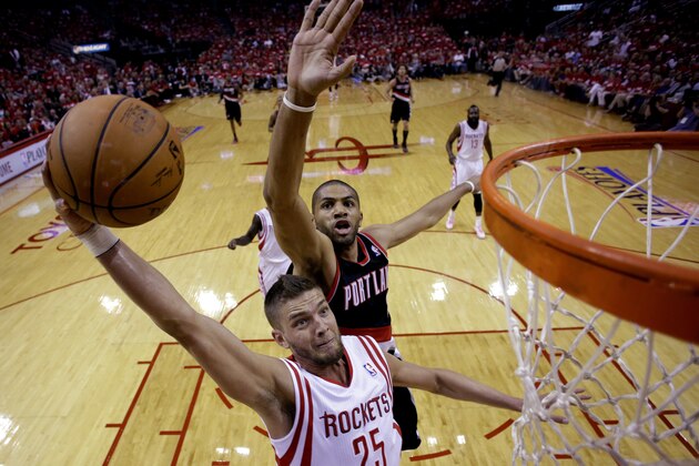Houston Rockets' Chandler Parsons (25) goes up for a shot as Portland Trail Blazers' Nicolas Batum defends during the first half in Game 1 of an opening-round NBA basketball playoff series, Sunday, April 20, 2014, in Houston. (AP Photo/David J. Phillip) Houston Rockets' Chandler Parsons (25) goes up for a shot as Portland Trail Blazers' Nicolas Batum defends during the first half in Game 1 of an opening-round NBA basketball playoff series, Sunday, April 20, 2014, in Houston. (AP Photo/David J. Phillip)