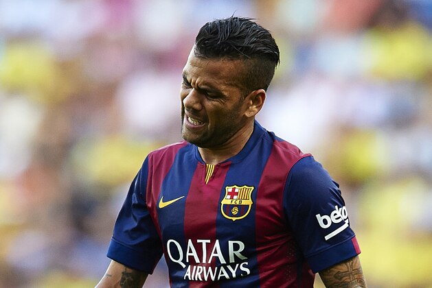 VILLARREAL, SPAIN - AUGUST 31:  Dani Alves of Barcelona gestures during the La Liga match between Villarreal CF and FC Barcelona at El Madrigal stadium on August 31, 2014 in Villarreal, Spain.  (Photo by Manuel Queimadelos Alonso/Getty Images)