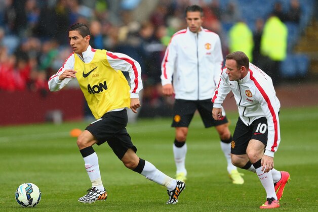 BURNLEY, ENGLAND - AUGUST 30:  Angel di Mariaand Wayne Rooney of Manchester United warm up during the Barclays Premier League match between Burnley and Manchester United at Turf Moor on August 30, 2014 in Burnley, England.  (Photo by Clive Brunskill/Getty Images)