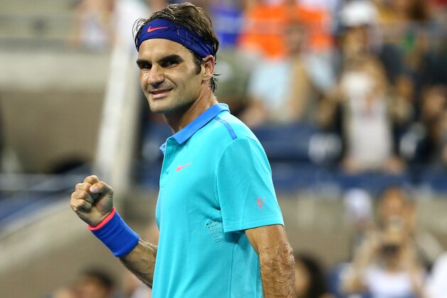 NEW YORK, NY - AUGUST 31:  Roger Federer of Switzerland reacts after defeating Marcel Granollers of Spain during their men's singles third round match on Day Seven of the 2014 US Open at the USTA Billie Jean King National Tennis Center on August 31, 2014 in the Flushing neighborhood of the Queens borough of New York City.  (Photo by Streeter Lecka/Getty Images)
