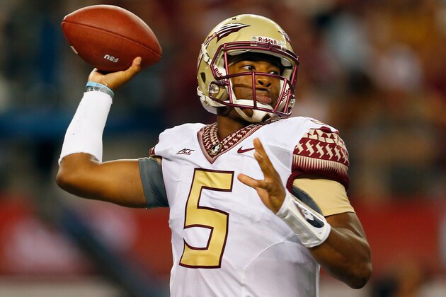 ARLINGTON, TX - AUGUST 30:  Jameis Winston #5 of the Florida State Seminoles passes against the Oklahoma State Cowboys in the first half of the Advocare Cowboys Classic at AT&T Stadium on August 30, 2014 in Arlington, Texas.  (Photo by Tom Pennington/Getty Images)