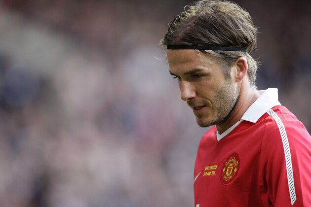 Former Manchester United player David Beckham is seen during his team's  friendly soccer match against Juventus at Old Trafford Stadium, Manchester, England, Tuesday May 24, 2011. (AP Photo/Jon Super)