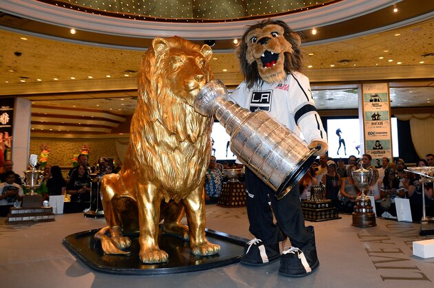 LAS VEGAS, NV - JUNE 20:  Los Angeles Kings mascot Bailey poses with the Stanley Cup at a display of NHL trophies at the MGM Grand Hotel/Casino on June 20, 2014 in Las Vegas, Nevada. The 2014 NHL Awards will be held in Las Vegas on June 24.  (Photo by Ethan Miller/Getty Images)