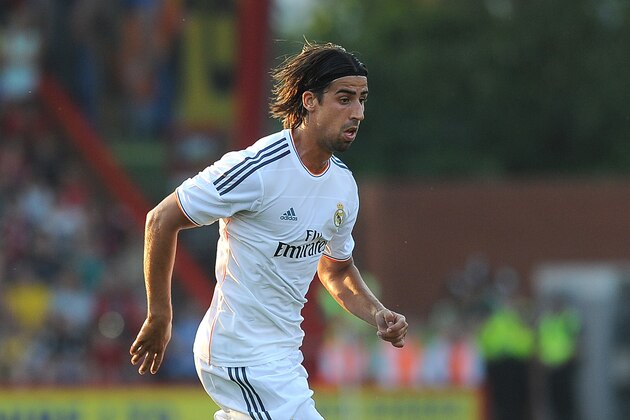BOURNEMOUTH, ENGLAND - JULY 21: Sami Khedira of Real Madrid attacks during the pre season friendly match between Bournemouth and Real Madrid at Goldsands Stadium on July 21, 2013 in Bournemouth, England, (Photo by Charlie Crowhurst/Getty Images)
