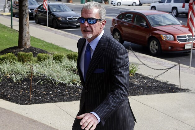 Indianapolis Colts owner Jim Irsay enters Hamilton County court in Noblesville, Ind., Tuesday, Sept. 2, 2014. Irsay is scheduled to appear in court for a change-of-plea hearing on drug-related charges he faces from a traffic stop in March.  (AP Photo/Michael Conroy)