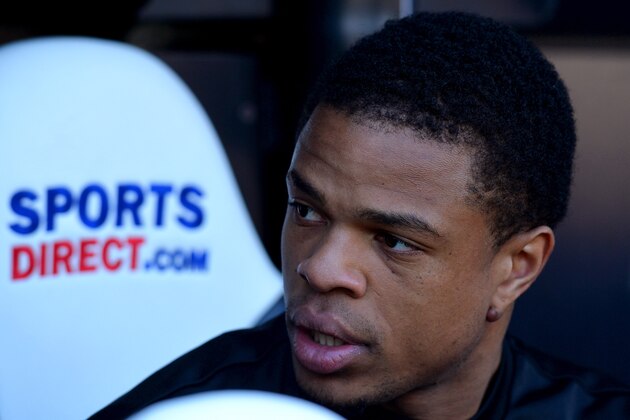 NEWCASTLE UPON TYNE, ENGLAND - APRIL 19:  Loic Remy of Newcastle United looks on from the bench during the Barclays Premier League match between Newcastle United and Swansea City at St James' Park on April 19, 2014 in Newcastle upon Tyne, England.  (Photo by Mark Runnacles/Getty Images)