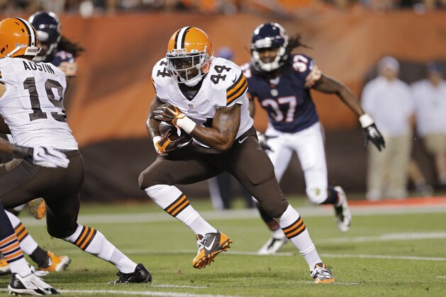 Cleveland Browns running back Ben Tate (44) runs for a 1-yard touchdown against the Chicago Bears in the first quarter of a preseason NFL football game Thursday, Aug. 28, 2014, in Cleveland. (AP Photo/Tony Dejak)