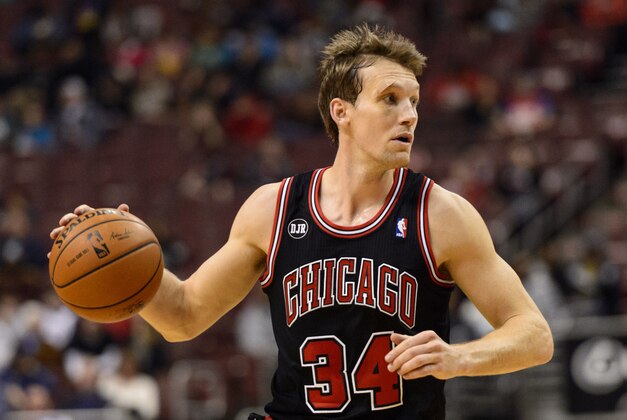 Mar 19, 2014; Philadelphia, PA, USA; Chicago Bulls forward Mike Dunleavy (34) during the first quarter against the Philadelphia 76ers at the Wells Fargo Center. The Bulls defeated the Sixers 102-94. Mandatory Credit: Howard Smith-USA TODAY Sports