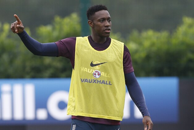 England's Danny Welbeck points during a training session at London Colney, Monday, Sept. 1, 2014. England will play Norway in an international friendly soccer match at Wembley Stadium on Wednesday. (AP Photo/Kirsty Wigglesworth)