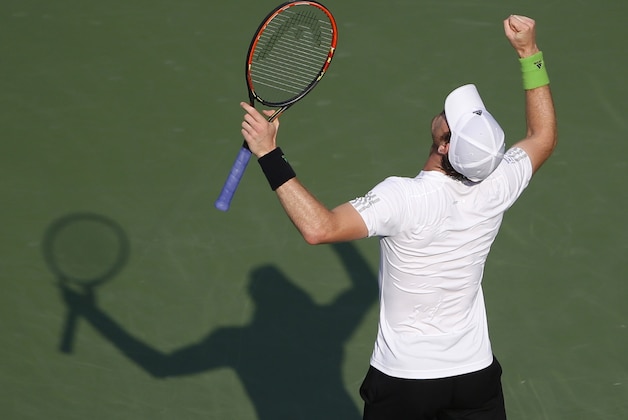 Andy Murray, of the United Kingdom, reacts after defeating Jo-Wilfried Tsonga, of France, during the fourth round of the 2014 U.S. Open tennis tournament, Monday, Sept. 1, 2014, in New York. (AP Photo/Seth Wenig)