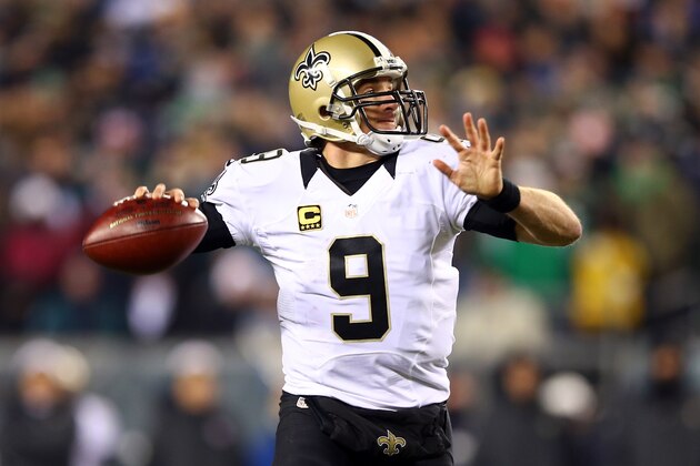 PHILADELPHIA, PA - JANUARY 04:  Drew Brees #9 of the New Orleans Saints throws a pass against the Philadelphia Eagles during their NFC Wild Card Playoff game at Lincoln Financial Field on January 4, 2014 in Philadelphia, Pennsylvania.  (Photo by Elsa/Getty Images)
