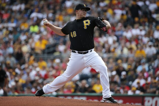 Pittsburgh Pirates starting pitcher Vance Worley (46) delivers during the first inning of a baseball game against the Cincinnati Reds in Pittsburgh Saturday, Aug. 30, 2014. (AP Photo/Gene J. Puskar)