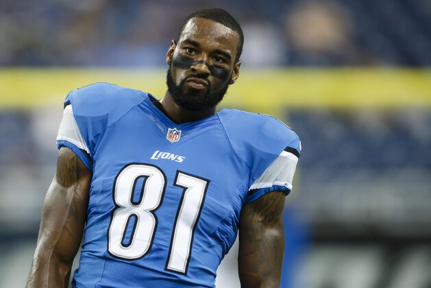 Detroit Lions wide receiver Calvin Johnson (81) during warm ups before a preseason NFL football game between the Detroit Lions and the Jacksonville Jaguars at Ford Field in Detroit, Friday, Aug. 22, 2014. (AP Photo/Rick Osentoski)