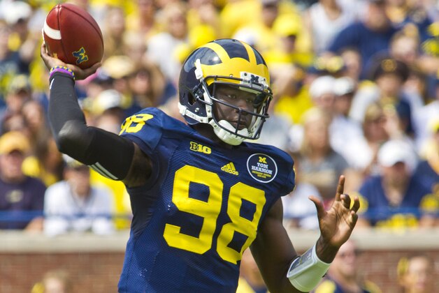 Michigan quarterback Devin Gardner (98) throws a pass in the first quarter of an NCAA college football game against Appalachian State in Ann Arbor, Mich., Saturday, Aug. 30, 2014. (AP Photo/Tony Ding)