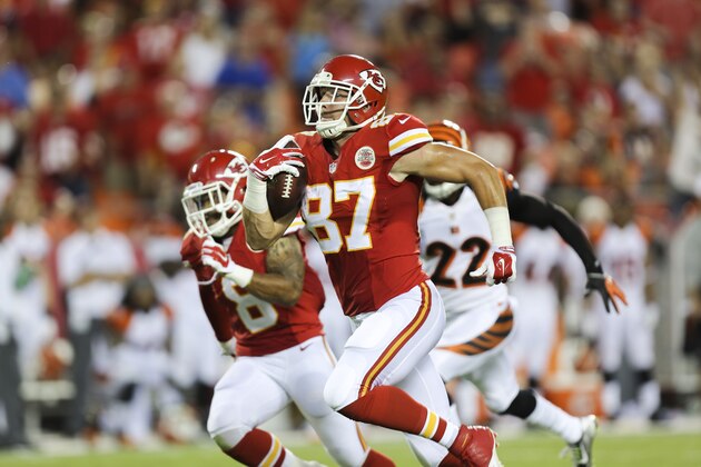 Kansas City Chiefs tight end Travis Kelce (87) runs for a touchdown reception in the first half of an NFL preseason football game against the Cincinnati Bengals Thursday, Aug. 7, 2014, in Kansas City, Mo. (AP Photo/Ed Zurga) Kansas City Chiefs tight end Travis Kelce (87) runs for a touchdown reception in the first half of an NFL preseason football game against the Cincinnati Bengals Thursday, Aug. 7, 2014, in Kansas City, Mo. (AP Photo/Ed Zurga)