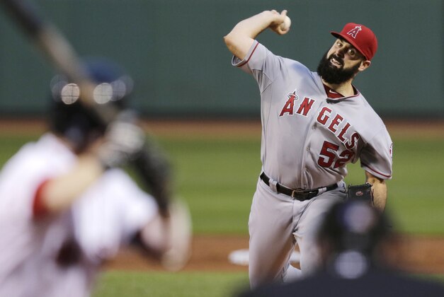 Los Angeles Angels starting pitcher Matt Shoemaker delivers to the Boston Red Sox during the first inning of a baseball game at Fenway Park in Boston, Thursday, Aug. 21, 2014. (AP Photo/Charles Krupa)