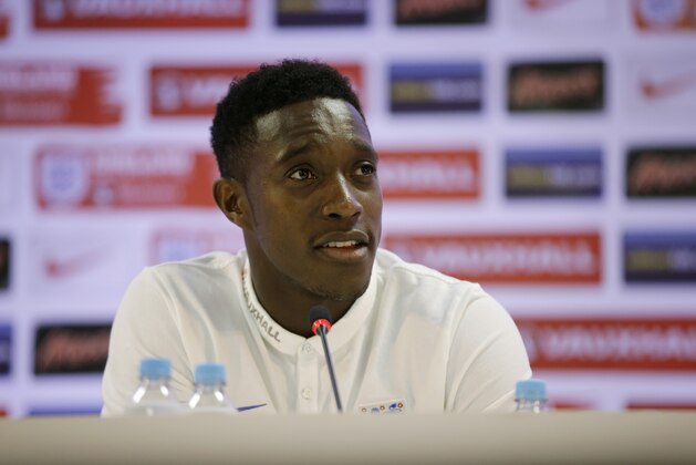 England national soccer team player Danny Welbeck answers a question from a journalist during a press conference after a squad training session for the 2014 soccer World Cup at the Urca military base in Rio de Janeiro, Brazil, Monday, June 16, 2014.  (AP Photo/Matt Dunham)