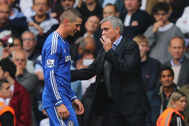 LONDON, ENGLAND - SEPTEMBER 28:  Jose Mourinho manager of Chelsea talks to Fernando Torres of Chelsea after he is sent off during the Barclays Premier League match between Tottenham Hotspur and Chelsea at White Hart Lane on September 28, 2013 in London, England.  (Photo by Clive Rose/Getty Images)