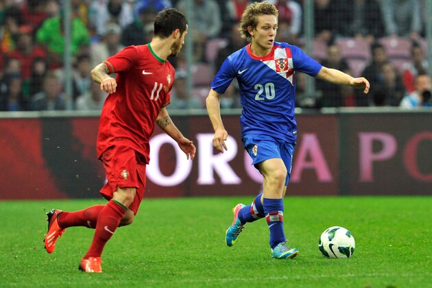 GENEVA, SWITZERLAND - JUNE 10:  Alen Halilovic of Croatia fights for the ball with Adelino Vieirinha of Portugal during the international friendly match between Portugal and Croatia on June 10, 2013 in Geneva, Switzerland.  (Photo by Harold Cunningham/Getty Images)